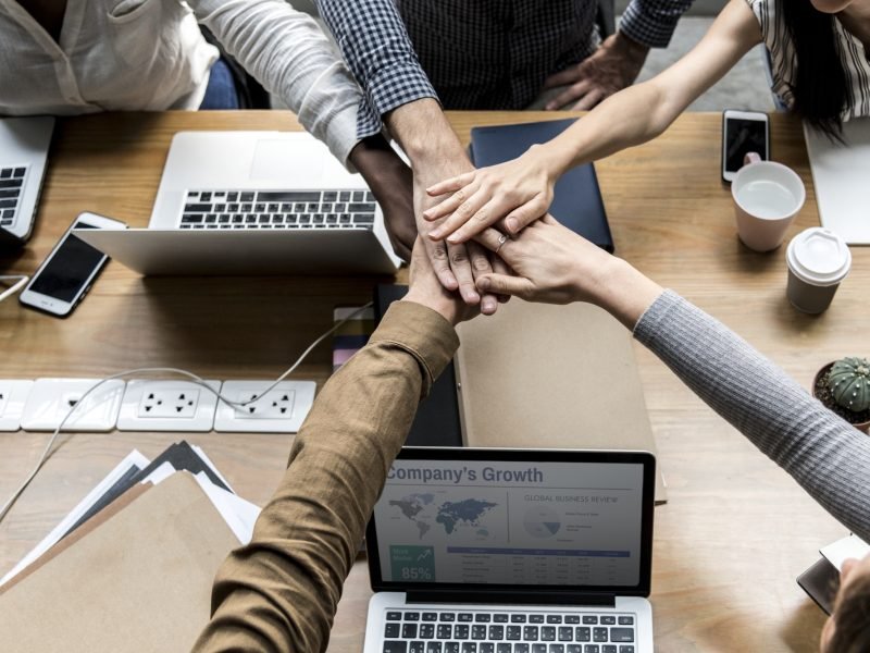 team-business-people-stacking-hands